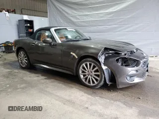 2017 FIAT 124 Spider Elaborazione Abarth z VIN JC1NFAEK1H0125019, wystawiony jako Copart lot #51663565 z przebiegiem Nie podano mil oraz Szkoda całkowita • Salvage title. Historia ofert i sprzedaży dostępna na DreamBid. Obrazek 4.