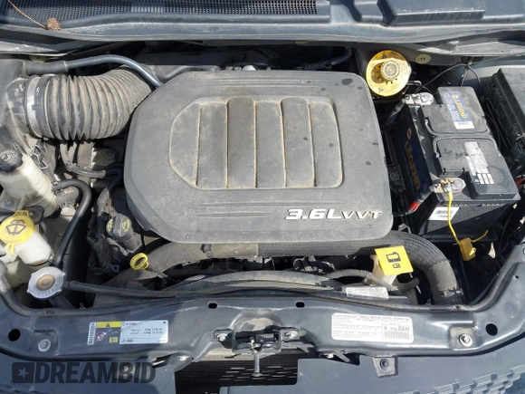 2014 Dodge Grand Caravan SXT with VIN 2C4RDGCG4ER106106, listed as a IAAI auction lot 41830512 with 135,044 mi miles and . Bid and sale history available at DreamBid. Image 10.