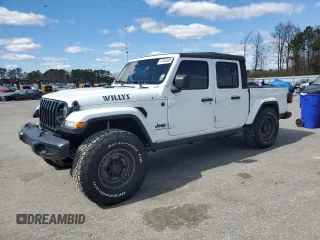 2023 Jeep Gladiator Sport S with VIN 1C6HJTAG4PL556387, listed as a Copart auction lot 47453305 with 35,611 mi miles and Salvage title. Bid and sale history available at DreamBid. Image 1.