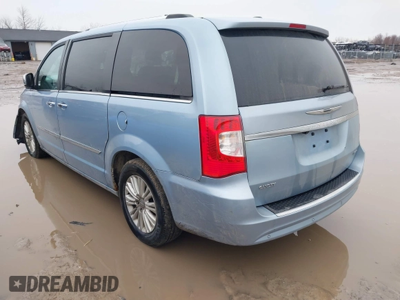 2013 Chrysler Town & Country Limited with VIN 2C4RC1GG0DR566307, listed as a IAAI auction lot 41941616 with 192,378 mi miles. Bid and sale history available at carsss.com. Image 3.