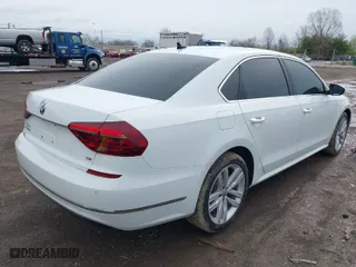 2018 Volkswagen Passat 2.0T SE with VIN 1VWBA7A35JC018885, listed as a IAAI auction lot 41955324 with 107,046 mi miles. Bid and sale history available at carsss.com. Image 4.