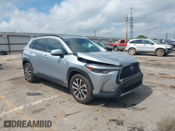 2023 Toyota Corolla Cross XLE with VIN 7MUDAAAG0PV057750, listed as a IAAI auction lot 42302284 with 31,404 mi miles and . Bid and sale history available at DreamBid. Image 1.