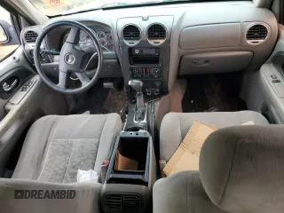 2005 GMC Envoy SLT with VIN 1GKDT13S152124404, listed as a Copart auction lot 64011494 with 212,951 mi miles and Salvage Title. Bid and sale history available at DreamBid. Image 8.