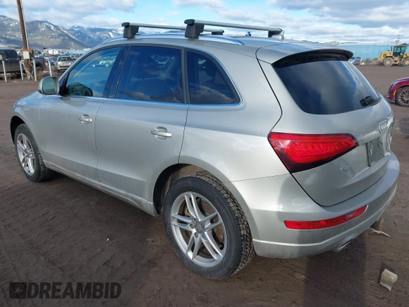 2014 Audi Q5 Premium Plus with VIN WA1CMAFP6EA063529, listed as a IAAI auction lot 41705364 with 154,501 mi miles and . Bid and sale history available at DreamBid. Image 3.