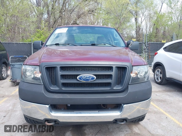 2005 Ford F-150 XLT with VIN 1FTPX14575KD79404, listed as a IAAI auction lot 42003073 with 212,050 mi miles. Bid and sale history available at carsss.com. Image 6.