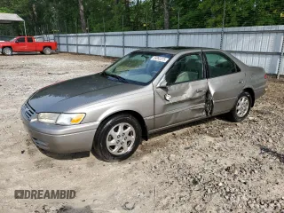1999 Toyota Camry LE z VIN JT2BF22K4X0155560, wystawiony jako Copart lot #55092375 z przebiegiem 182 290 mil mil oraz Szkoda całkowita • Salvage title. Historia ofert i sprzedaży dostępna na DreamBid. Obrazek 1.