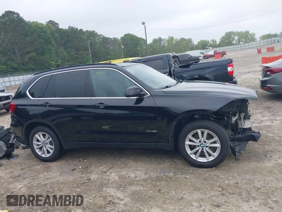 2014 BMW X5 xDrive35i z VIN 5UXKR0C58E0H26011, wystawiony jako IAAI lot #42147773 z przebiegiem 131 173 mil mil oraz . Historia ofert i sprzedaży dostępna na DreamBid. Obrazek 14.