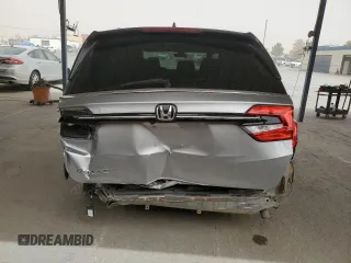 2022 Honda Odyssey EX-L with VIN 5FNRL6H75NB059962, listed as a Copart auction lot 51464615 with 40,608 mi miles and Salvage Title. Bid and sale history available at DreamBid. Image 6.