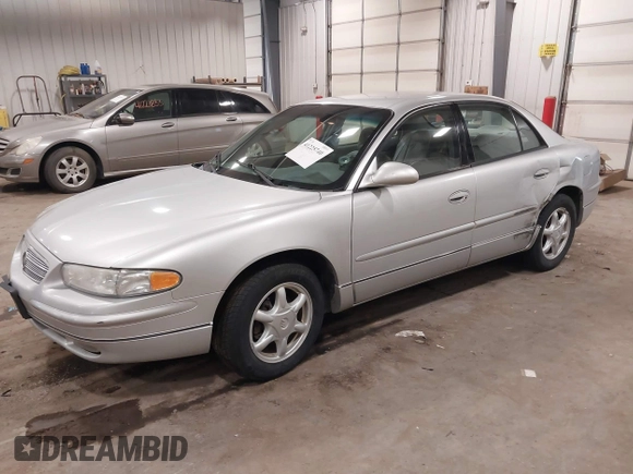 2004 Buick Regal LS with VIN 2G4WB52K041324734, listed as a IAAI auction lot 41225740 with 64,583 mi miles and . Bid and sale history available at DreamBid. Image 2.