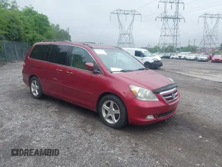 2005 Honda Odyssey Touring z VIN 5FNRL38855B117222, wystawiony jako IAAI lot #42188307 z przebiegiem 236 044 mil mil oraz . Historia ofert i sprzedaży dostępna na DreamBid. Obrazek 1.