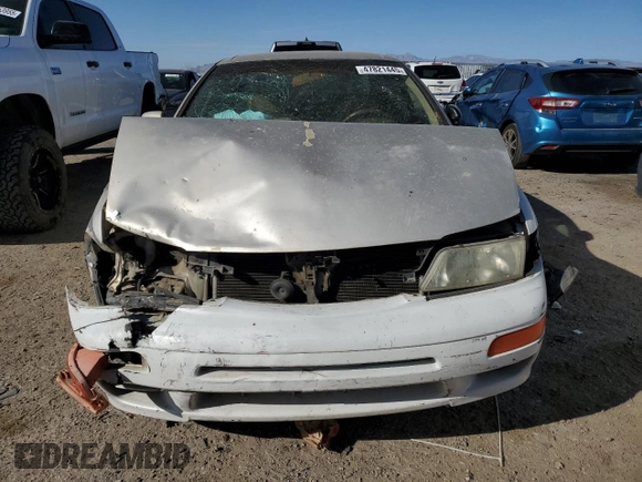 1998 Nissan Maxima GXE with VIN JN1CA21D0WM903051, listed as a Copart auction lot 47821445 with 156,748 mi miles and Salvage title. Bid and sale history available at DreamBid. Image 5.