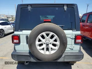 2023 Jeep Wrangler Sport S with VIN 1C4HJXDG5PW623797, listed as a Copart auction lot 66359625 with 16,518 mi miles and Salvage title. Bid and sale history available at DreamBid. Image 6.