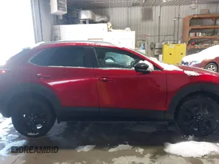 2022 Mazda CX-30 2.5 Turbo with VIN 3MVDMBAY5NM427943, listed as a IAAI auction lot 41585519 with 32,807 mi miles and . Bid and sale history available at DreamBid. Image 13.