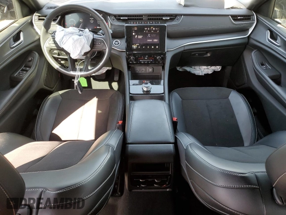 2024 Jeep Grand Cherokee Altitude with VIN 1C4RJHAG3R8939561, listed as a Copart auction lot 56419615 with 9,383 mi miles and Salvage title. Bid and sale history available at DreamBid. Image 8.