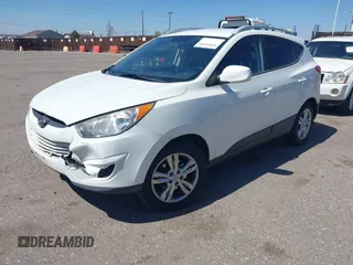 2011 Hyundai Tucson Limited with VIN KM8JUCAC0BU206509, listed as a IAAI auction lot 42034266 with 185,989 mi miles and . Bid and sale history available at DreamBid. Image 2.