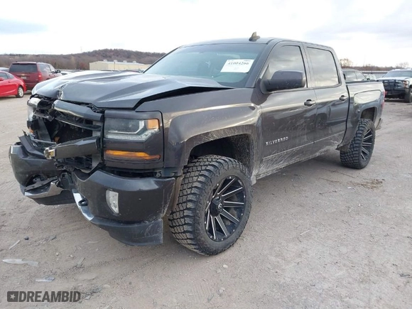 2016 Chevrolet Silverado 1500 LT with VIN 3GCUKREC0GG252047, listed as a IAAI auction lot 41004266 with 170,817 mi miles. Bid and sale history available at carsss.com. Image 2.