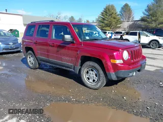 2014 Jeep Patriot Sport with VIN 1C4NJRBB6ED809492, listed as a IAAI auction lot 41644559 with 199,782 mi miles. Bid and sale history available at carsss.com. Image 1.
