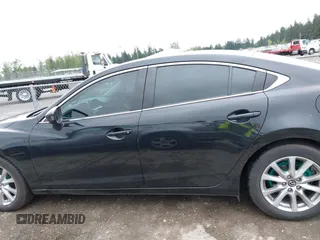 2016 Mazda 6 i Sport with VIN JM1GJ1U53G1451578, listed as a IAAI auction lot 42134810 with 113,144 mi miles and . Bid and sale history available at DreamBid. Image 14.