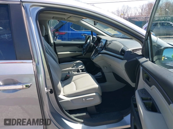 2018 Honda Odyssey EX-L with VIN 5FNRL6H75JB092633, listed as a IAAI auction lot 41971589 with 103,099 mi miles and . Bid and sale history available at DreamBid. Image 5.