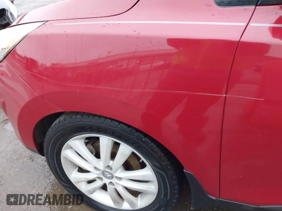 2013 Hyundai Tucson GLS with VIN KM8JU3AC8DU683546, listed as a IAAI auction lot 41956167 with 141,510 mi miles. Bid and sale history available at carsss.com. Image 18.