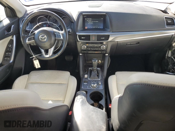 2016 Mazda CX-5 Grand Touring with VIN JM3KE2DY4G0704001, listed as a Copart auction lot 49666445 with 149,000 mi miles and Salvage Title. Bid and sale history available at carsss.com. Image 8.