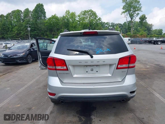 2012 Dodge Journey SXT z VIN 3C4PDCBGXCT324756, wystawiony jako IAAI lot #42422533 z przebiegiem 241 934 mil mil oraz . Historia ofert i sprzedaży dostępna na DreamBid. Obrazek 16.