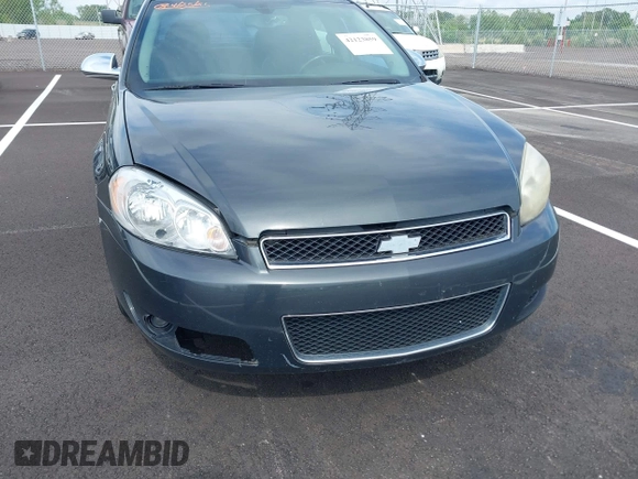 2013 Chevrolet Impala LTZ with VIN 2G1WC5E36D1187393, listed as a IAAI auction lot 42123859 with 176,539 mi miles and . Bid and sale history available at DreamBid. Image 6.