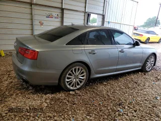 2013 Audi A6 Prestige with VIN WAUJGAFC9DN060792, listed as a Copart auction lot 58141305 with 129,735 mi miles and Salvage title. Bid and sale history available at DreamBid. Image 3.