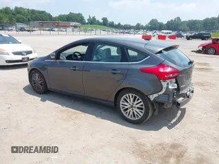 2016 Ford Focus Titanium with VIN 1FADP3N28GL299339, listed as a IAAI auction lot 42410154 with 78,245 mi miles and . Bid and sale history available at DreamBid. Image 3.