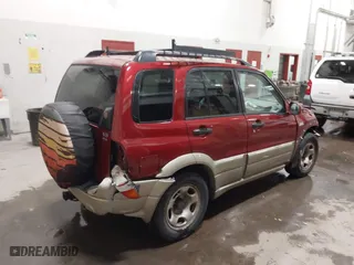 2002 Suzuki Grand Vitara JLX with VIN JS3TD62VX24155102, listed as a IAAI auction lot 41603245 with 152,657 mi miles. Bid and sale history available at carsss.com. Image 4.