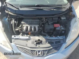 2011 Honda Fit Sport z VIN JHMGE8H53BC021245, wystawiony jako Copart lot #55393345 z przebiegiem 133 910 mil mil oraz Szkody całkowita. Historia ofert i sprzedaży dostępna na DreamBid. Obrazek 11.