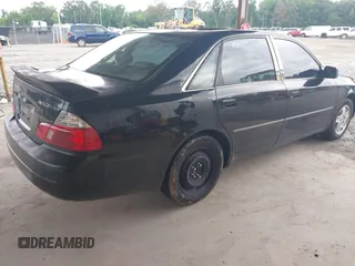 2003 Toyota Avalon XL z VIN 4T1BF28B33U291465, wystawiony jako IAAI lot #42482001 z przebiegiem 203 028 mil mil oraz . Historia ofert i sprzedaży dostępna na DreamBid. Obrazek 4.