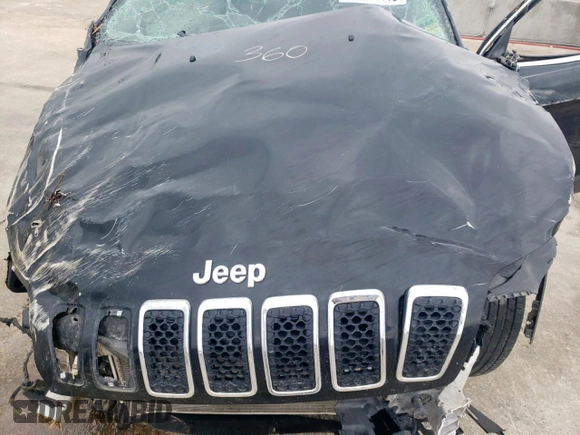 2022 Jeep Cherokee Latitude Lux with VIN 1C4PJLMX3ND501694, listed as a Copart auction lot 60551415 with 112,268 mi miles and Salvage title. Bid and sale history available at DreamBid. Image 12.