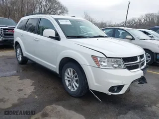 2016 Dodge Journey SXT with VIN 3C4PDCBG0GT206463, listed as a IAAI auction lot 41832864 with 135,409 mi miles. Bid and sale history available at carsss.com. Image 1.