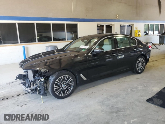 2018 BMW 5 Series 540i xDrive with VIN WBAJE7C56JWC57314, listed as a Copart auction lot 60610715 with 73,015 mi miles and Salvage title. Bid and sale history available at DreamBid. Image 1.