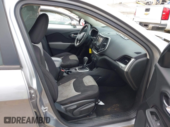 2014 Jeep Cherokee Sport with VIN 1C4PJLAB1EW314418, listed as a IAAI auction lot 41935643 with 177,262 mi miles and . Bid and sale history available at DreamBid. Image 5.