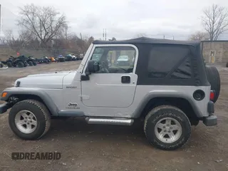 2004 Jeep Wrangler Sport with VIN 1J4FA49S64P749380, listed as a IAAI auction lot 41935405 with 84,690 mi miles. Bid and sale history available at carsss.com. Image 14.