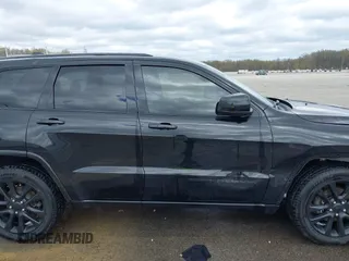 2018 Jeep Grand Cherokee Laredo with VIN 1C4RJFAG7JC468391, listed as a IAAI auction lot 42010443 with 91,585 mi miles and . Bid and sale history available at DreamBid. Image 13.