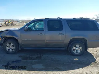2011 Chevrolet Suburban LT with VIN 1GNSKJE34BR335361, listed as a IAAI auction lot 41736341 with 170,422 mi miles. Bid and sale history available at carsss.com. Image 15.