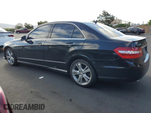 2013 Mercedes-Benz E 350 Luxury with VIN WDDHF5KBXDA687457, listed as a Copart auction lot 56534515 with 141,808 mi miles and Salvage title. Bid and sale history available at DreamBid. Image 2.