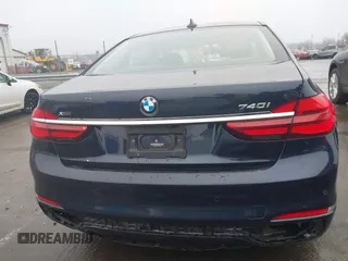 2019 BMW 7 Series 740i xDrive with VIN WBA7E4C52KGV70359, listed as a IAAI auction lot 41421504 with 55,734 mi miles and . Bid and sale history available at carsss.com. Image 16.