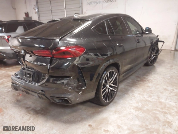 2021 BMW X6 xDrive40i with VIN 5UXCY6C03M9E61703, listed as a IAAI auction lot 41602401 with 1 mi miles. Bid and sale history available at carsss.com. Image 4.