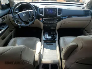 2018 Honda Pilot Elite with VIN 5FNYF6H03JB019900, listed as a Copart auction lot 57497235 with 60,358 mi miles and Salvage title. Bid and sale history available at DreamBid. Image 8.