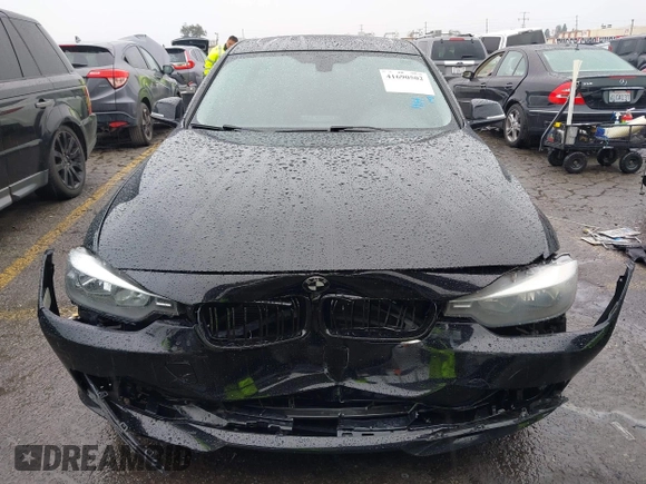 2015 BMW 3 Series 328i with VIN WBA3A5C59FF606236, listed as a IAAI auction lot 41690502 with 115,085 mi miles. Bid and sale history available at carsss.com. Image 12.