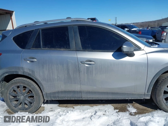 2013 Mazda CX-5 Grand Touring with VIN JM3KE4DE4D0168115, listed as a IAAI auction lot 41610004 with 190,690 mi miles. Bid and sale history available at carsss.com. Image 14.