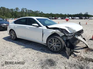 2021 Cadillac CT5 Luxury with VIN 1G6DW5RKXM0112301, listed as a Copart auction lot 52497035 with 69,261 mi miles and Salvage title. Bid and sale history available at DreamBid. Image 4.