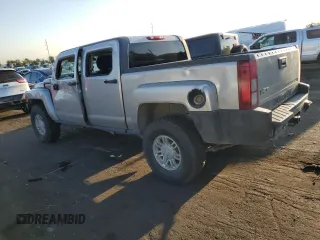 2009 Hummer H3 with VIN 5GNEN13E698128049, listed as a Copart auction lot 70453514 with 154,567 mi miles and Salvage Title. Bid and sale history available at DreamBid. Image 2.