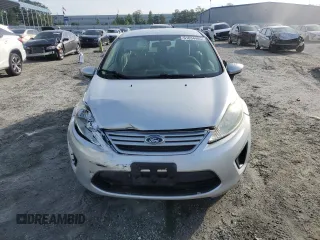 2013 Ford Fiesta S z VIN 3FADP4AJ9DM140665, wystawiony jako Copart lot #61634485 z przebiegiem 165 124 mil mil oraz Szkoda całkowita • Salvage title. Historia ofert i sprzedaży dostępna na DreamBid. Obrazek 5.