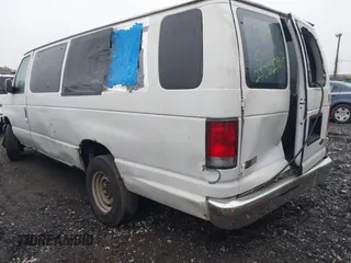 2003 Ford Econoline Passenger XL with VIN 1FBSS31L13HA69576, listed as a IAAI auction lot 41818210 with 240,315 mi miles and . Bid and sale history available at DreamBid. Image 3.