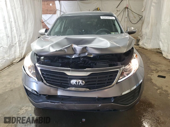 2013 Kia Sportage LX с VIN KNDPBCA23D7504226, выставлен на аукционе Copart как лот 63759715 с пробегом 89 883 миль миль и Списание • Salvage title. История ставок и продаж доступна на DreamBid. Изображение 5.